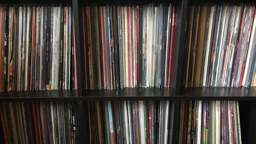 Vinyl records on black IKEA Kallax shelf