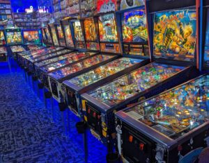 A row of pinball machines at Next Level Pinball Museum in Oregon.