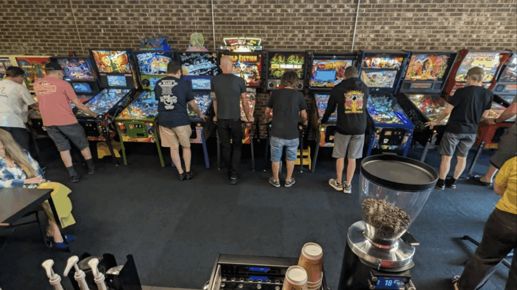 People playing pinball at Pin Grounds in Roselle, IL.